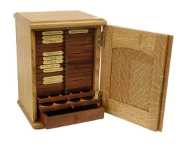 A Coin Collectors Cabinet, intended for sovereigns, in oak with 16x trays with (20x) 27mm felt lined