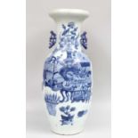 A Chinese Porcelain Vase, 19th century, with pierced twin handles, painted in underglaze blue with