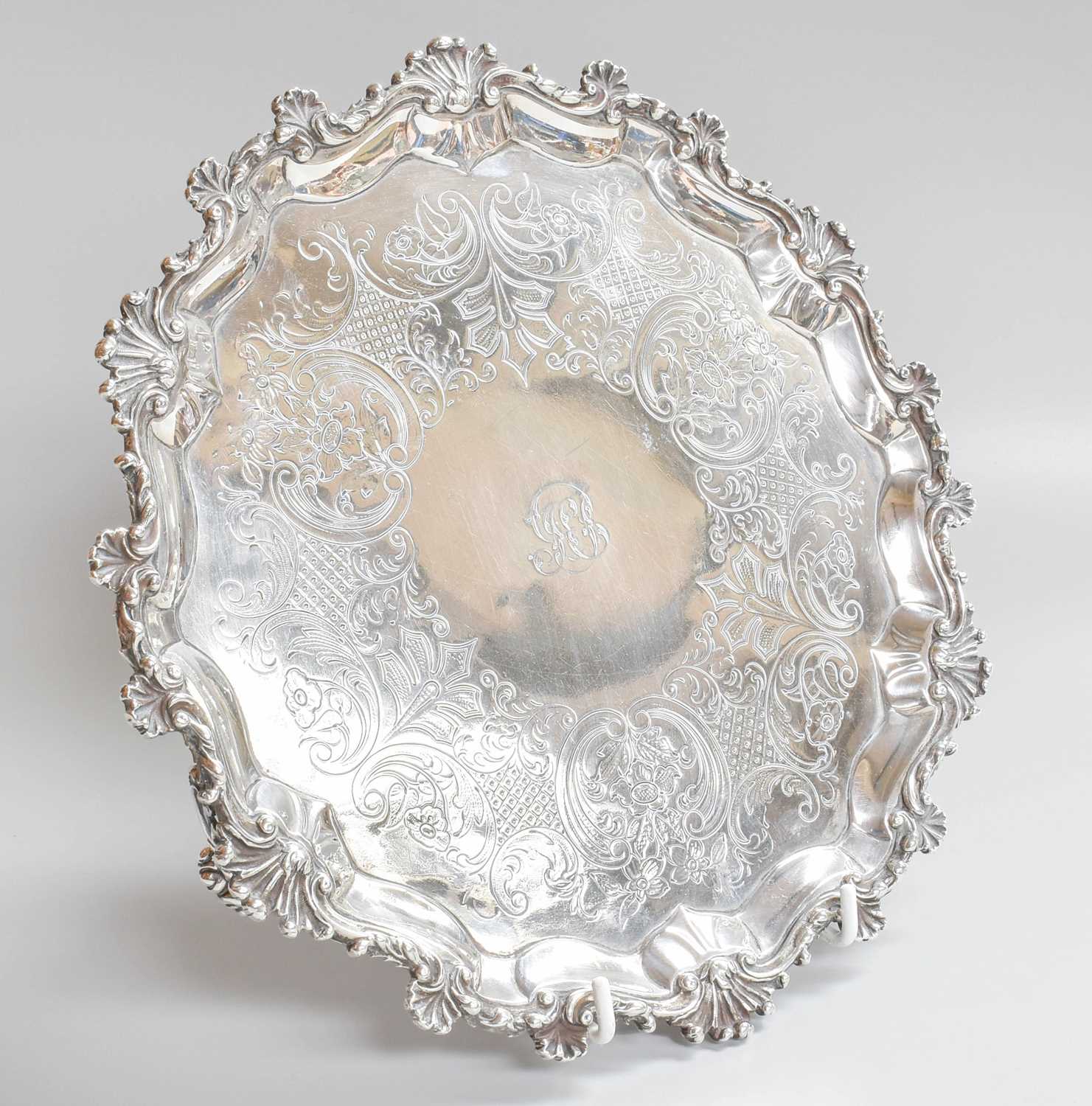 A Victorian Silver Salver, by Samuel Hayne and Dudley Cater, London, 1852, shaped circular and on