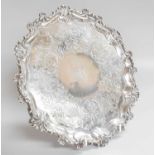 A Victorian Silver Salver, by Samuel Hayne and Dudley Cater, London, 1852, shaped circular and on