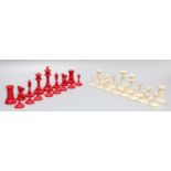 A 19th Century Carved and Turned Bone Chess Set, (one side stained red), King pieces, 8cm