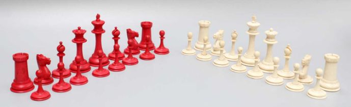 A 19th Century Carved and Turned Bone Chess Set, (one side stained red), King pieces, 8cm