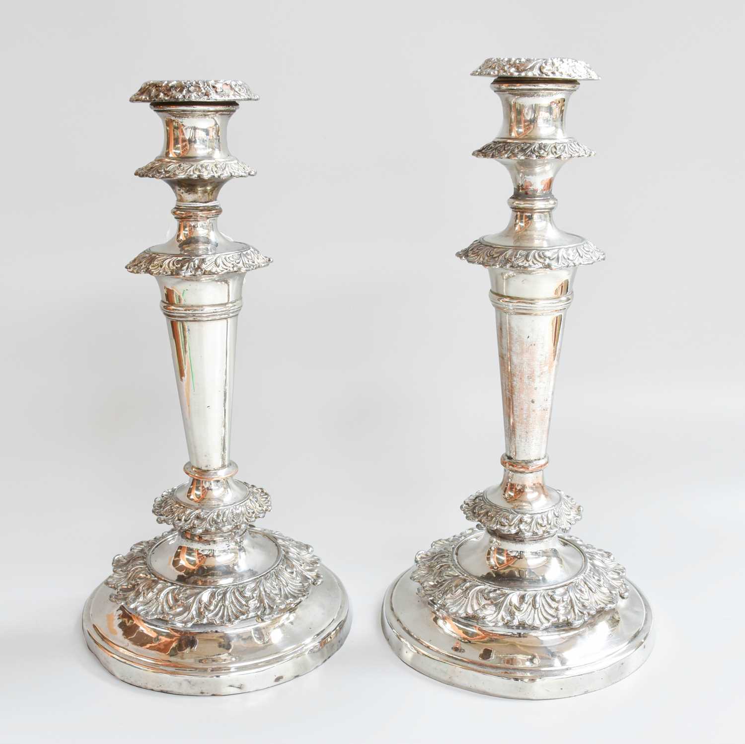 A Pair of Old Sheffield Plate Candlesticks, Apparently Unmarked, Circa 1830, each on circular base