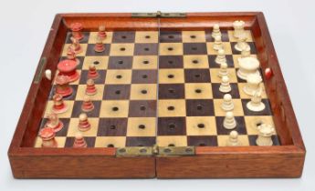 Jacques & Son, London, an "In Statu Quo" travelling Chess Board with bone and stained bone pieces (