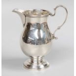 A George V Silver Cream-Jug, by James R. Ogden and Sons Ltd., Birmingham, 1935, in the George II