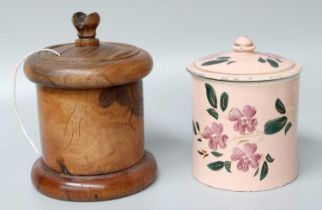 A Treen String Dispenser, 19th century; together with a folk art potato printed pottery jar and