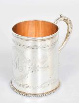 A Victorian Silver Christening-Mug, by Alexander Macrae, London, 1868, tapering and with leaf-capped