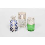 Three Various Silver-Mounted Glass Scent-Bottles, comprising two cylindrical examples, one in cut