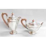 A George V Silver Teapot and Hot-Water Jug, by Fattorini and Sons Ltd., Birmingham, 1917, each