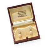 A Pair of Cultured Pearl and Diamond Drop Earrings, the old cut diamonds in white claw settings,