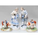 A Large Pair of German Porcelain Figures, late 19th century, modelled as a lady and gent,