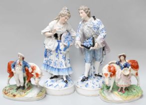 A Large Pair of German Porcelain Figures, late 19th century, modelled as a lady and gent,