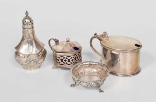 Four Assorted Silver Condiment-Items, comprising a Victorian oval mustard-pot with beaded borders; a