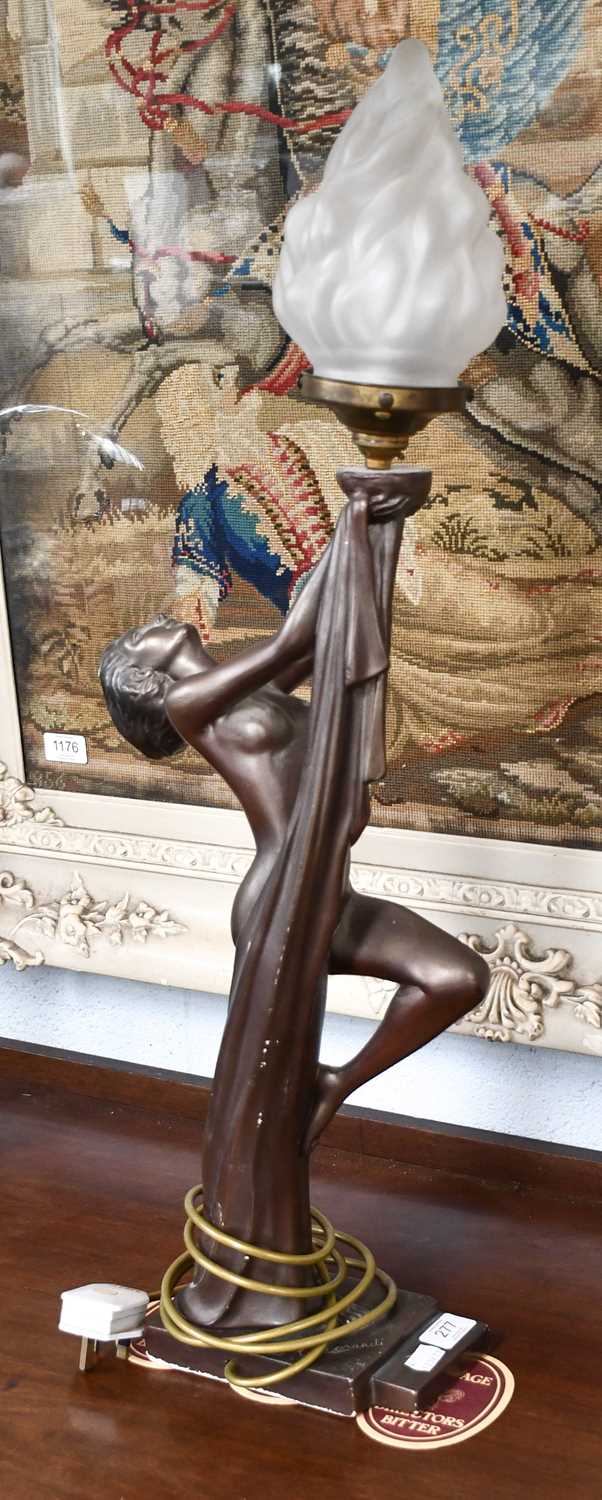 An Art Deco Figural Lamp