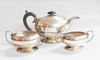 A Three-Piece George V Silver Tea-Service, by Joseph Gloster Ltd., Birmingham, 1935, each piece oval
