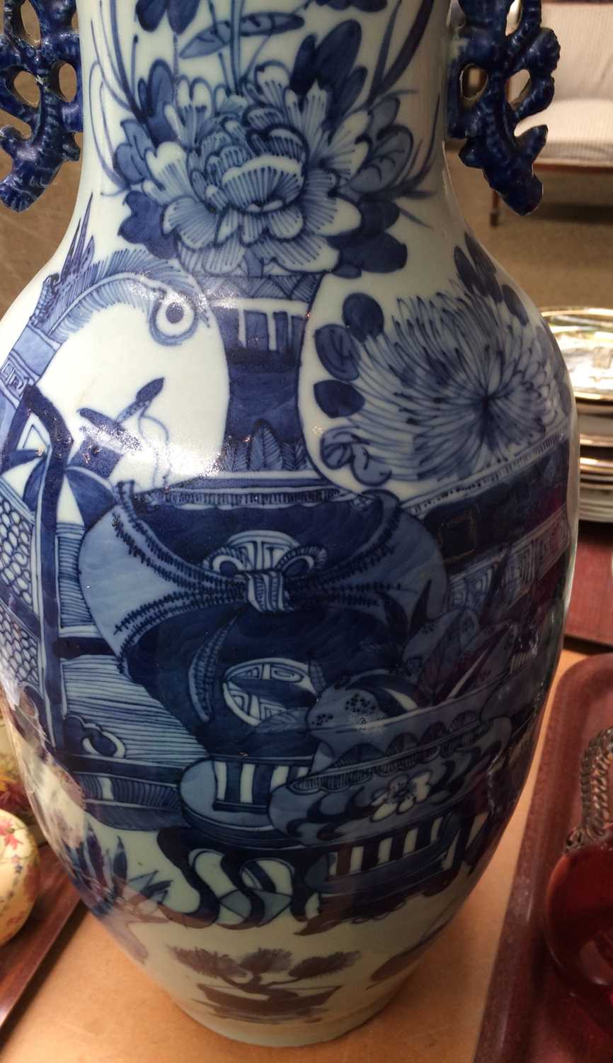 A Chinese Porcelain Vase, 19th century, with pierced twin handles, painted in underglaze blue with - Image 8 of 8