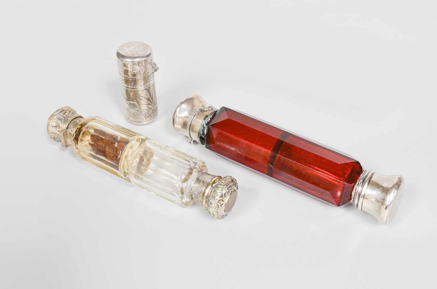 A Victorian Silver Scent-Bottle, by Sampson Mordan, London, 1880, cylindrical and applied with a