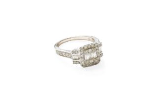 A 14 Carat White Gold Diamond Cluster Ring, composed of round brilliant cut and baguette cut