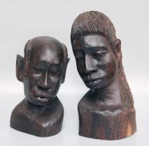 Two Jamaican Lignum Vitae Carved Busts, of a man and a woman, signed to base W. Cameron, 19cm and