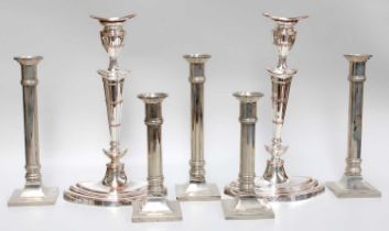 A Pair of Silver Plate Candlesticks, in the Adam Style, with tapered columns on spreading