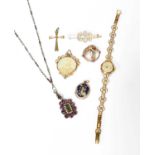 A Small Quantity of Jewellery, including a cross pendant; an enamel locket (a.f.); a double sided