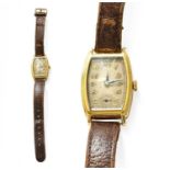 An 18 Carat Gold Tonneau Shaped Wristwatch Winding smoothly and in going order Gross weight - 23.9