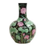 A Large Chinese Porcelain Bottle Vase, 20th Century, black ground and painted with a lotus pond,