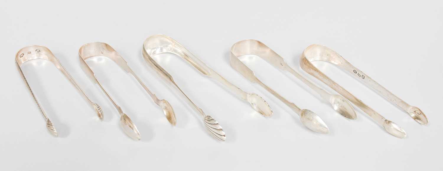 Five Pairs of George III and Later Silver Sugar-Tongs, including an Irish pair by John Power,
