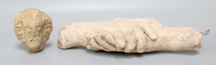 A Plaster Cast of Two Clasped Hands, and a small carving of a bearded head (2)
