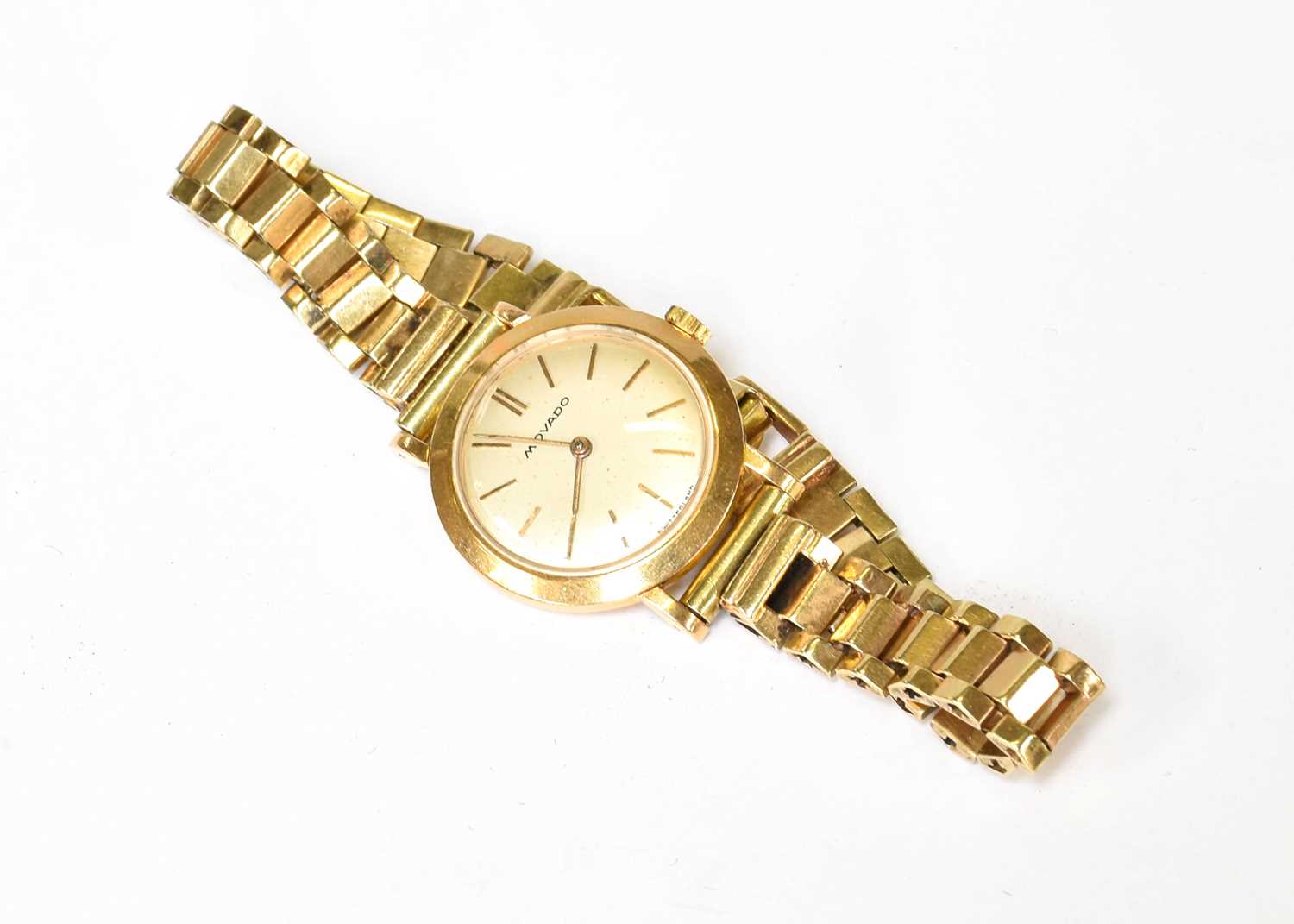 A Lady's 18 Carat Gold Movado Wristwatch, later bracelet with clasp stamped 14k Total weight - 25.