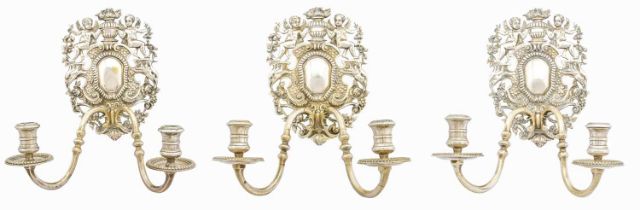 A Set of Three Silver Plate Two-Light Wall-Sconces, Apparently Unmarked, 20th Century, each in the