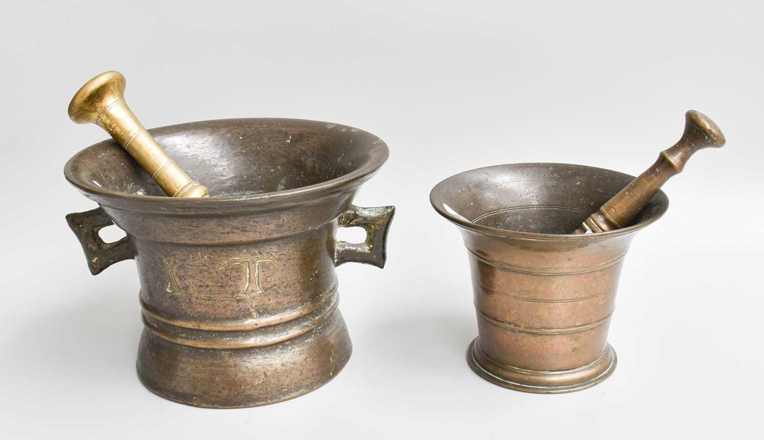 A 17th Century Twin-Handled Bronze Mortar, one side engraved "I.T.", the other brazed with an "A",