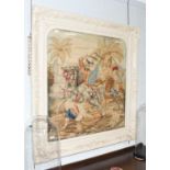 A Victorian Needlework Panel, depicting Indian figures on horseback, 86cm by 81cm not including