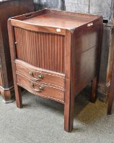 A George III Mahogany Serpentine Tambour Front Bedside Commode, with gallery top and two dummy