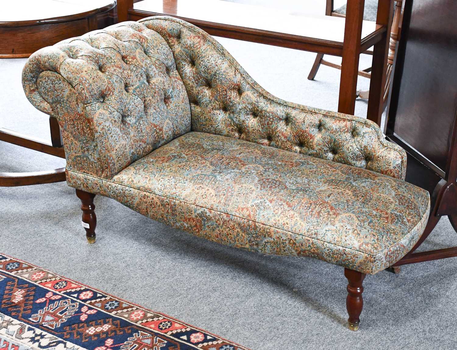 A Victorian Style Chaise Longue, with Liberty floral upholstery, 140cm long Supports are very