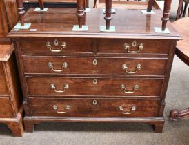 A George III Mahogany Four Height Chest of Drawers, with two short over three long graduated