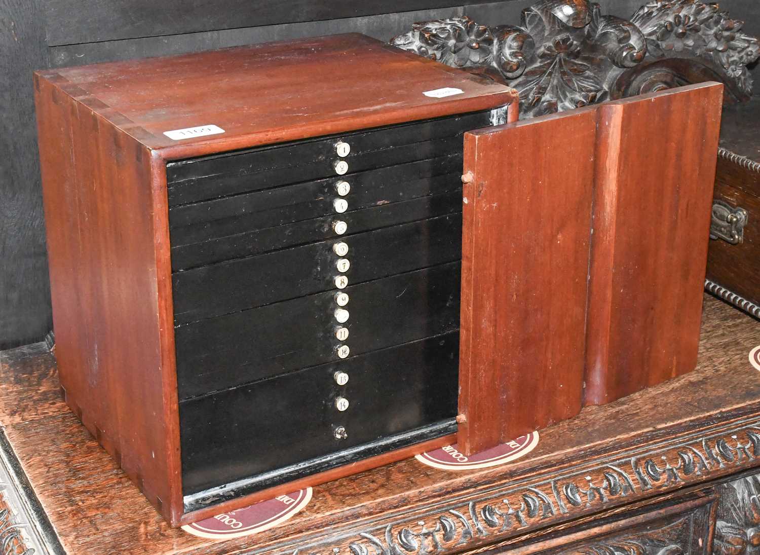 A 19th Century Mahogany Collectors Cabinet, with numbered bone drawer pulls, 30cm by 24.5cm by 29cm