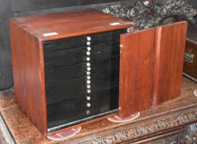 A 19th Century Mahogany Collectors Cabinet, with numbered bone drawer pulls, 30cm by 24.5cm by 29cm