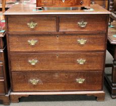 A George III Oak Four Height Chest of Drawers, moulded rectangular top over two short and three