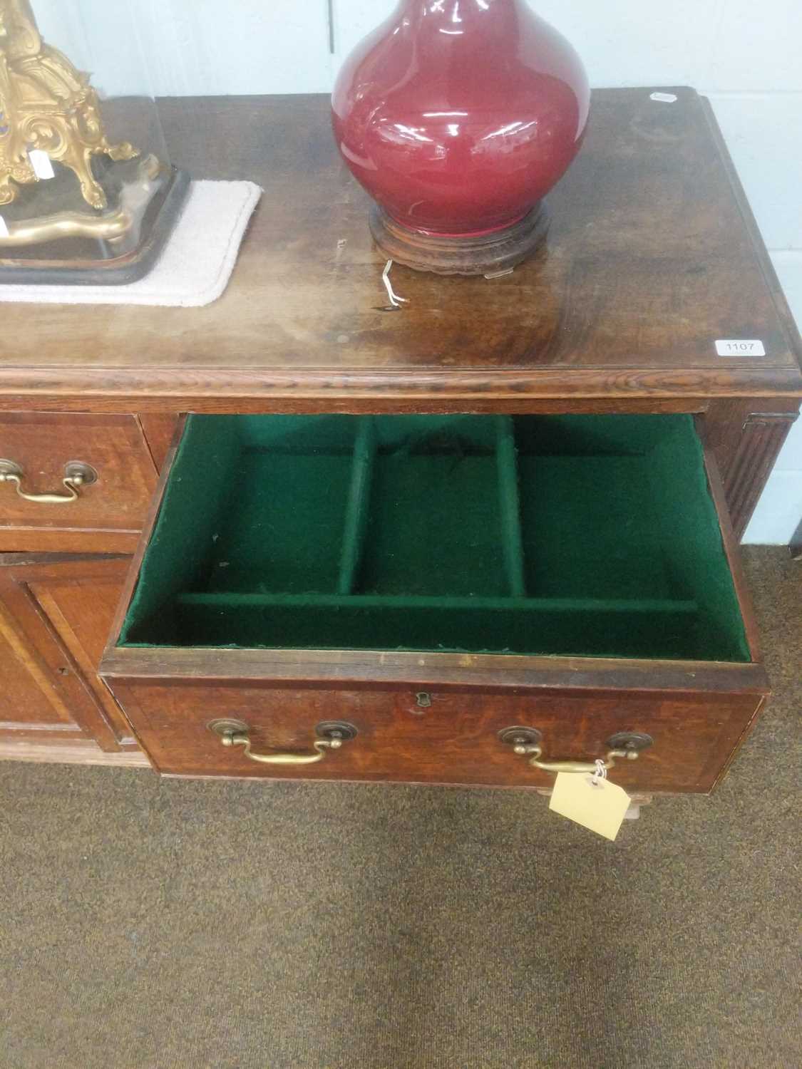 An 18th Century Oak Dresser Base, the moulded rectangular top over an arrangement of seven drawers - Image 2 of 7