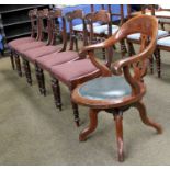 A Victorian Mahogany Swivel Office Chair, with pierced baluster shaped splat and leather seat;