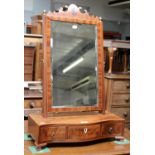 A Regency Mahogany Dressing Table Mirror, with strung inlay and three drawer serpentine base, bone