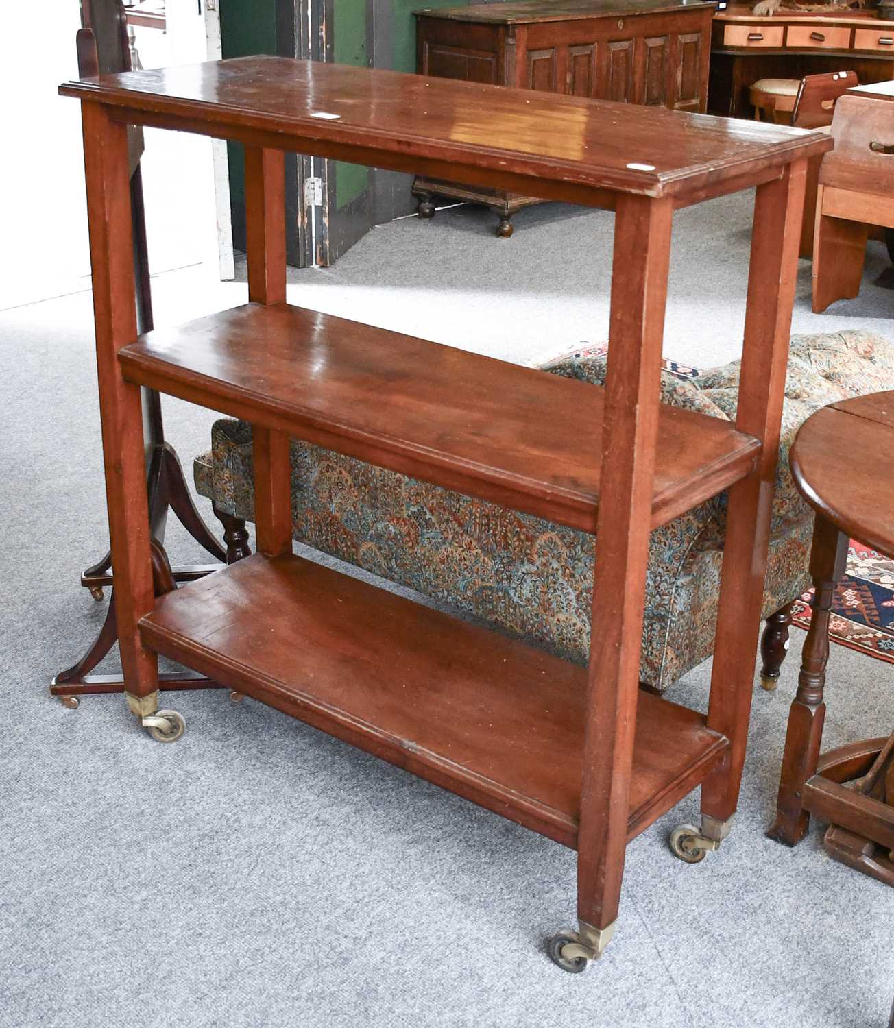 A Mahogany Three Tier Buffet, 107cm by 43cm by 117cm