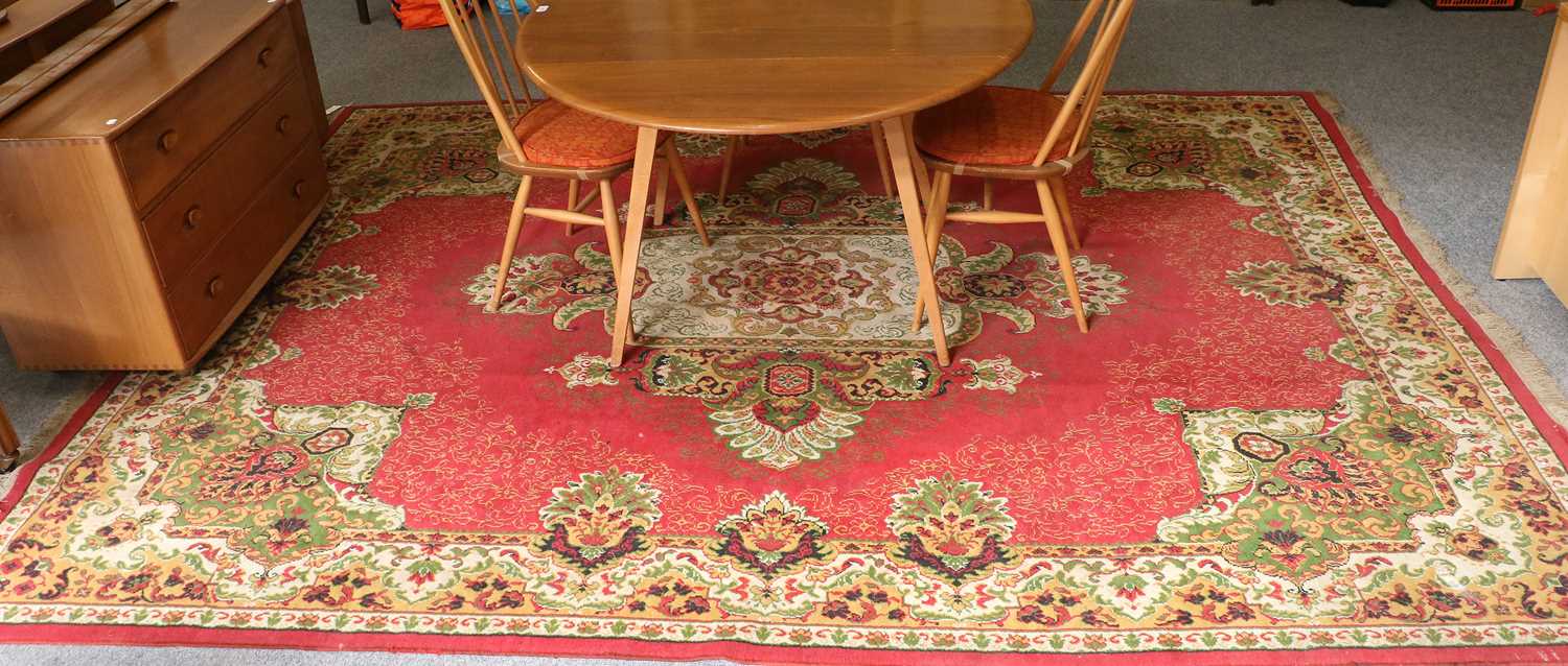 Machine Made Carpet of Oriental Design, the raspberry field centred by ivory medallion enclosed by - Image 2 of 3