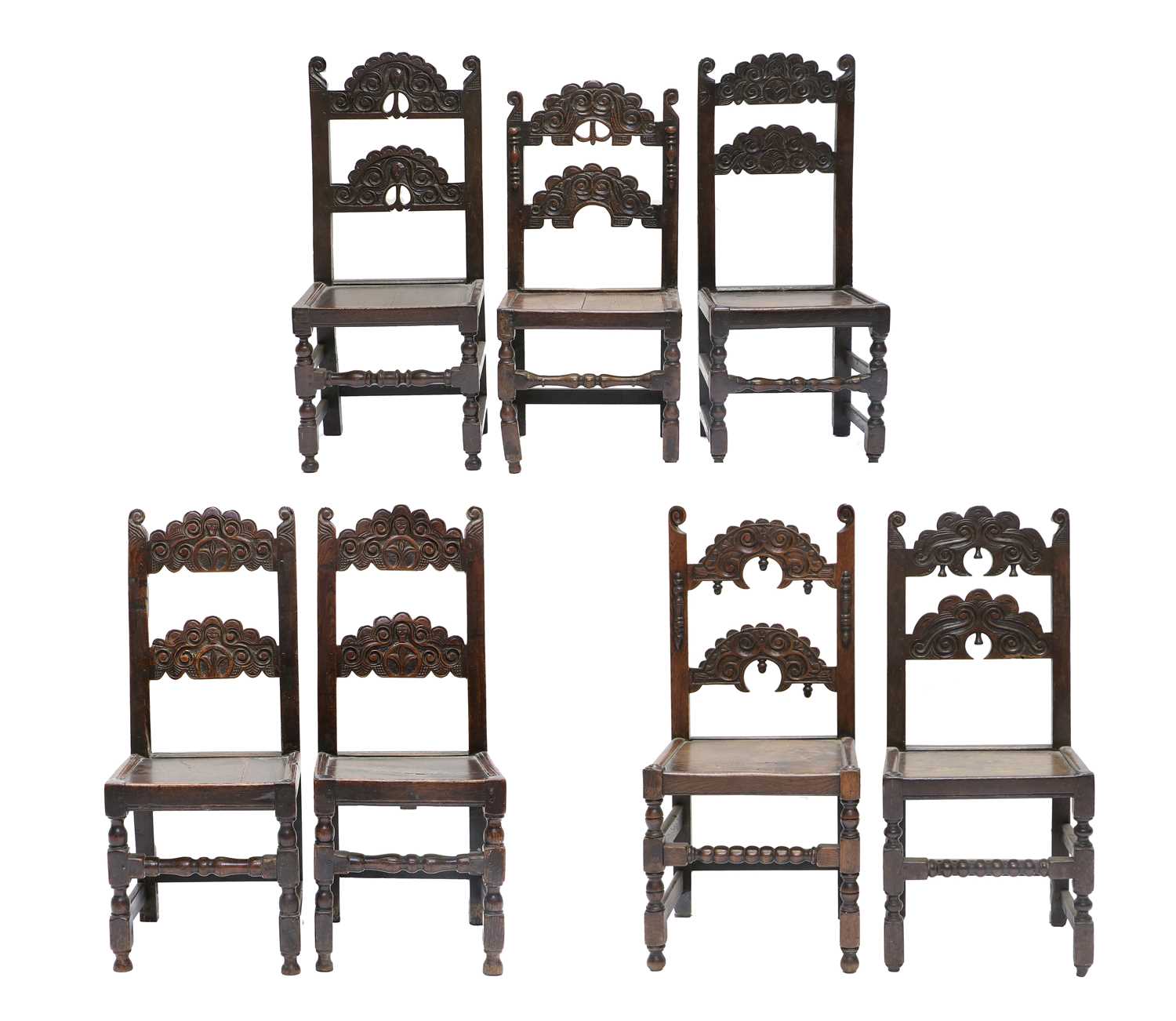 A Harlequin Set of Seven Late 17th Century Joined Oak Yorkshire Back Stools, comprising: a pair with