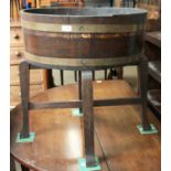 A Staived Oak Planter on Stand, early 20th century, makers R.A.Lister & Co, with metal liner, 59cm