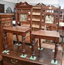 Two Similar Late Victorian Mahogany Hall Chairs, the back rest set with Minton tiles, titled ''The