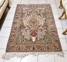 Oriental Part-Silk Prayer Rug, probably Isfahan, the field with urns, scrolling leaves and