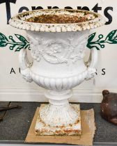 A 19th Century White Painted Cast Iron Campana Urn, twin-handled and part gadrooned, cast with
