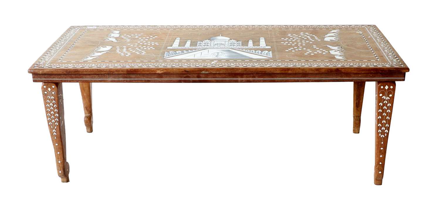 An Indian Hardwood Inlaid Coffee Table, decorated with the Taj Mahal and elephants, 101cm by 50cm by